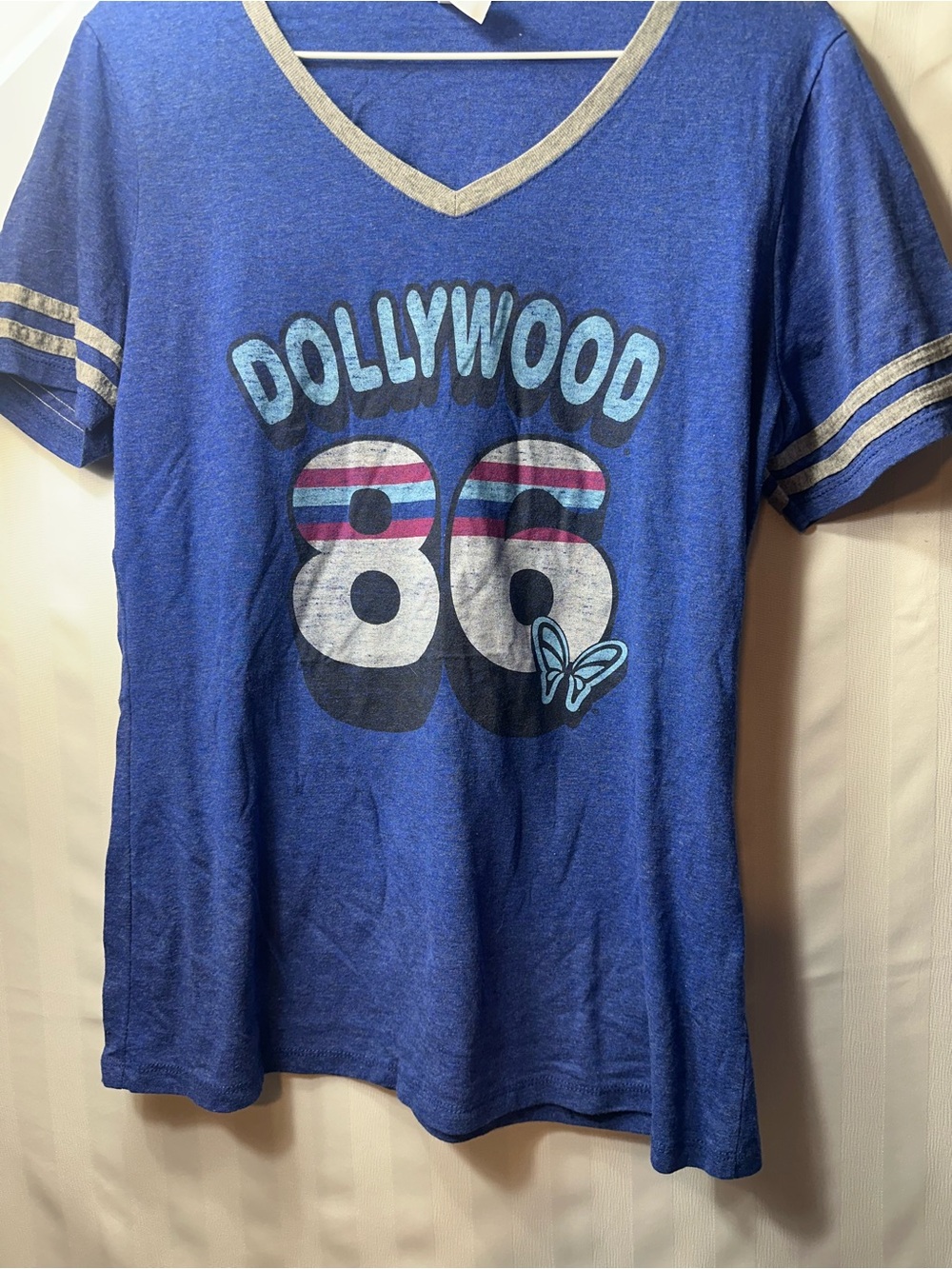 Guess Blue 'Dollywood 86' V‑Neck Tee with Stripes